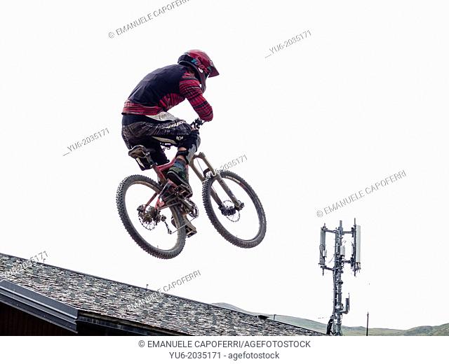 Stunts on a mountain bike in Livigno, Lombardy, Italy