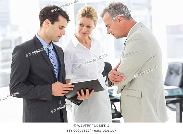 Business team going over documents