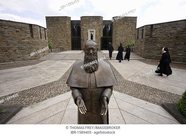 Bronze statue of Father Josef Kentenich, founder of the International Schoenstatt Movement, in front of the Pater-Kentenich-Haus building in Vallendar