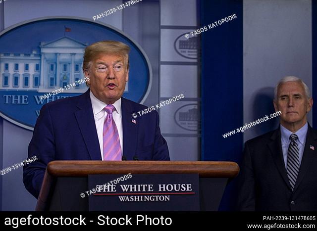 United States President Donald J. Trump speaks as US Vice President Mike Pence at the coronavirus briefing at the White House Washington, D.C., U.S