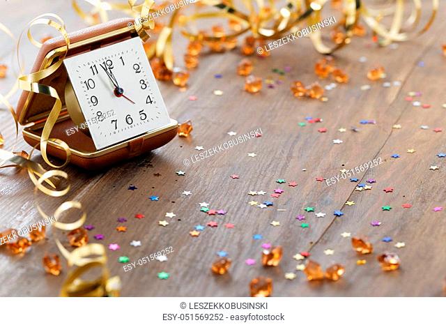 Happy New Year. Old clock on abstract background