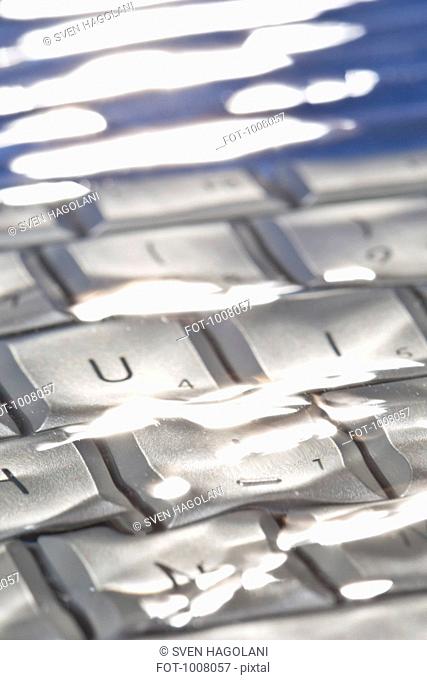 Detail of a computer keyboard underwater