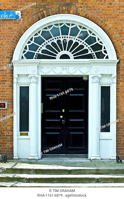 Traditional doorway with fanlight windows in Merrion Square famous for its Georgian architecture, Dublin, Ireland