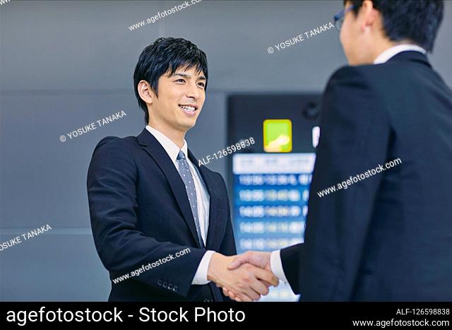 Japanese businessmen at the airport