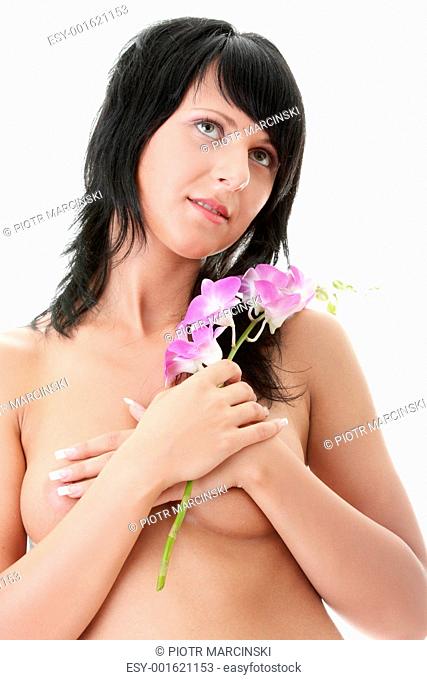 Beautiful Caucasian woman and orchid