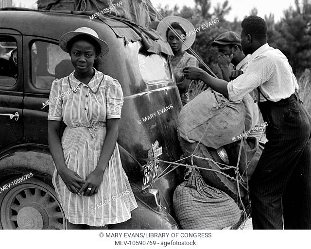 Group of Florida migrants on their way to Cranberry, New Jersey, to pick potatoes. Near Shawboro, North Carolina. Date 1940 July