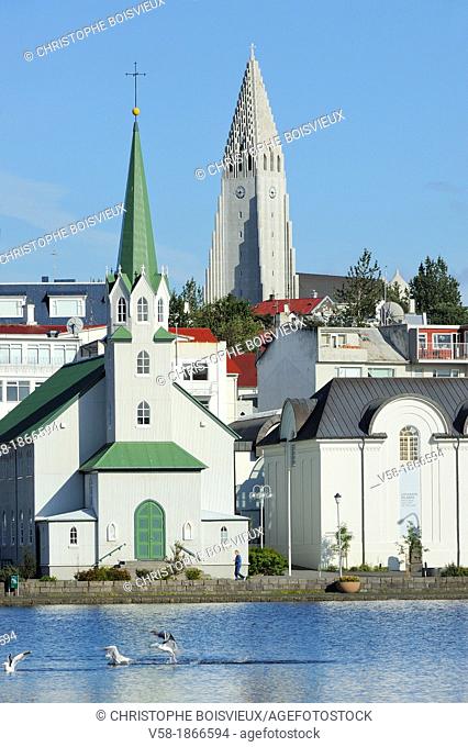 Iceland, Rekjavik, Tjornin lake, Free church Frikirkjan, National Gallery and Hallgrimskirkja church