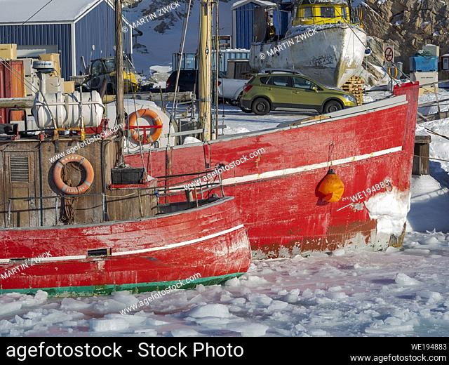Winter in the frozen harbour of town Ilulissat on the shore of Disko Bay. America, North America, Greenland, Denmark