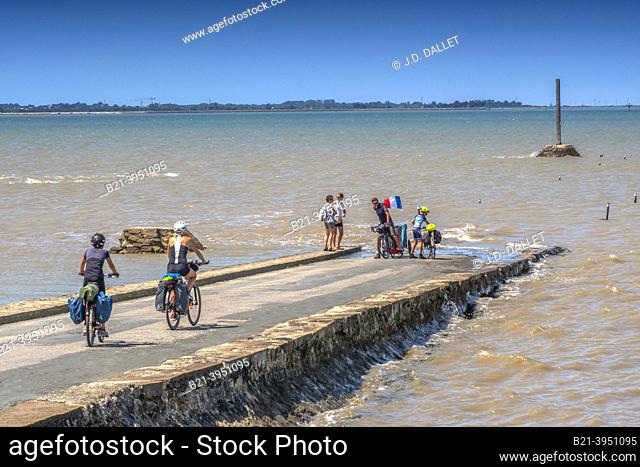 France-Pays de Loire-Vendée- when the tide is covering the ""Gois"" road, going from the main land to the Islnd of Noirmoutier