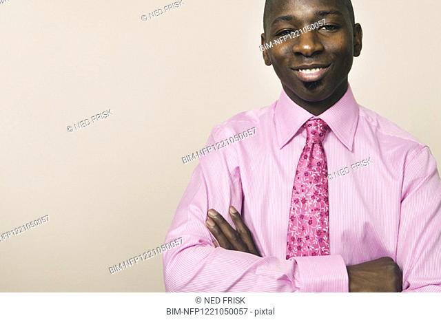 Portrait of African businessman with arms crossed