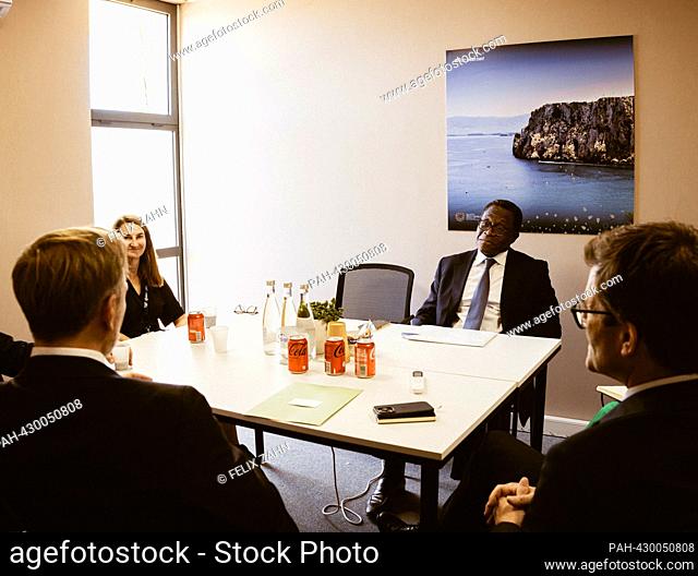 Christian Lindner (FDP), Federal Minister of Finance, meets Bernard Mensah, President of the Bank of America for a discussion at the annual meeting of the IMF...