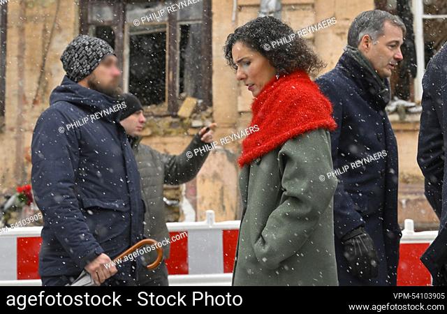 Prime Minister Alexander De Croo and Foreign minister Hadja Lahbib pictured during a visit to destroyed buildings in Triokhsviatytelska street and other areas...