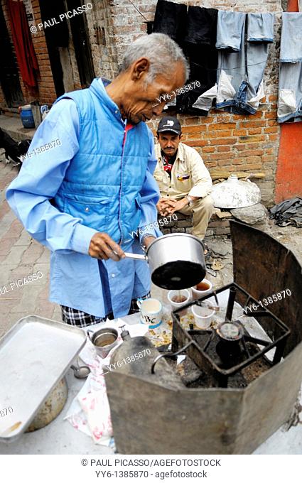 nepalis coofee and tea vendor, early morning , the nepalis , life in kathmandu , kathmandu street life , nepal