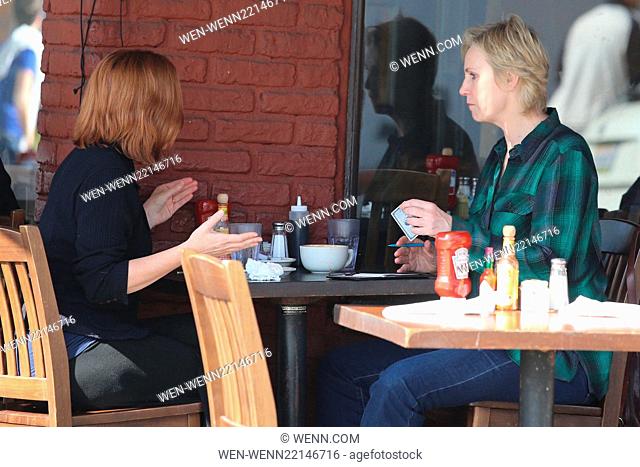 Jane Lynch pays for her lunch with a friend at King's Road Cafe with her American Express Card. Featuring: Jane Lynch Where: Los Angeles, California