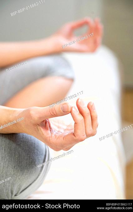 Close-up of woman's hands during a meditation session