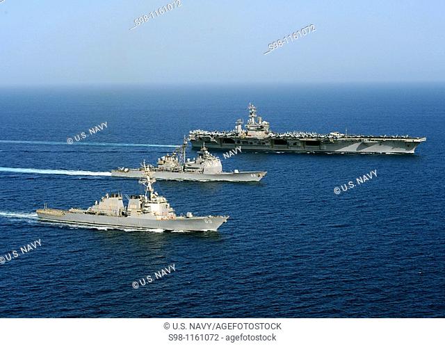 090428-N-9988F-815 ARABIAN SEA April 28, 2009 Three U S  Navy ships sharing the same hull number, the aircraft carrier USS Dwight D  Eisenhower CVN 69
