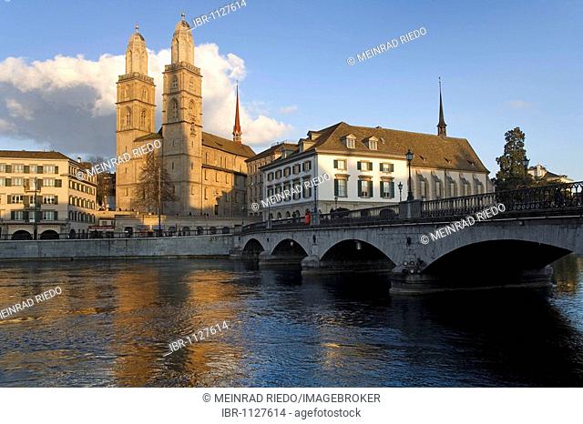 Historic centre of Zurich on Limmat River, Muensterbruecke Bridge, Grossmuenster Minster and the Wasserkirche Church, Zurich, Switzerland, Europe