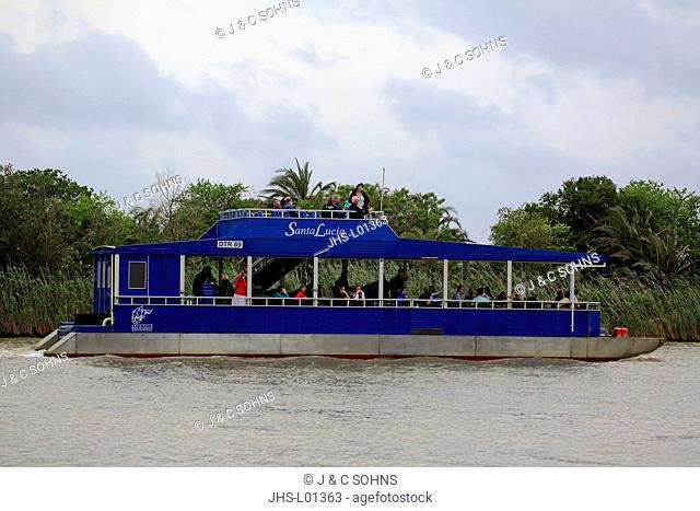 Excursion boat, tourists on boat safari, St Lucia, St Lucia Estuary, Isimangaliso Wetland Park, Kwazulu Natal, South Africa, Africa
