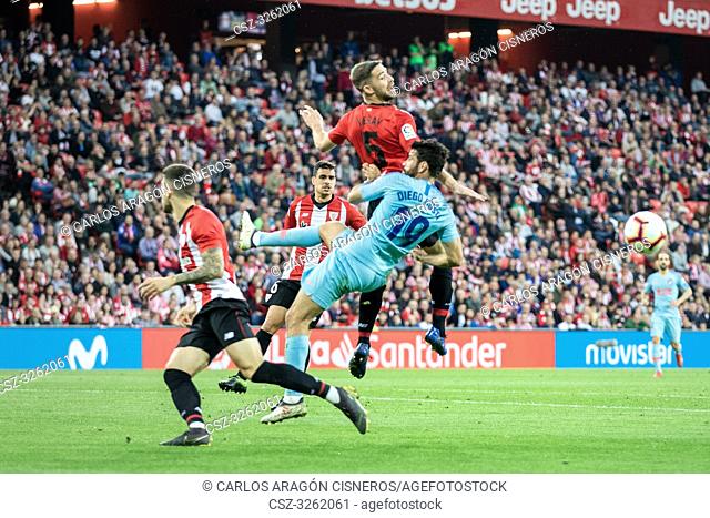 Diego Costa and Yeray Alvarez dispute the ball during a Spanish League match between Athletic Club Bilbao and Athletico de Madrid at San Mames Stadium on March...