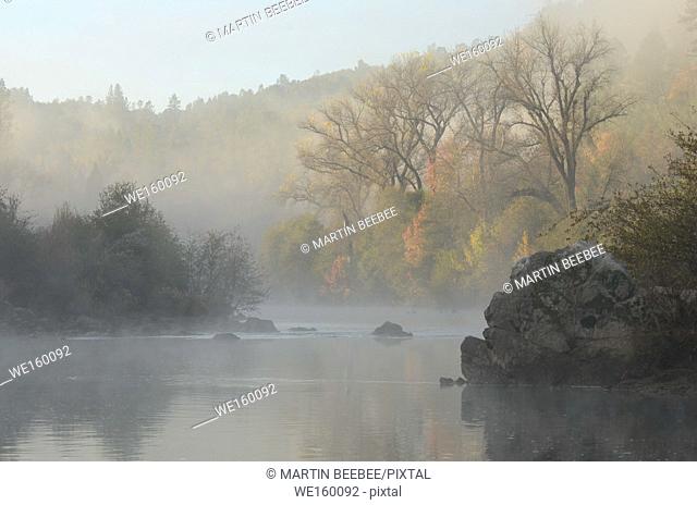 South Fork American River shrouded in early morning mist, near Lotus, California