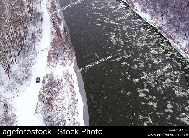 RUSSIA, NOVOSIBIRSK REGION - NOVEMBER 2, 2023: An aerial view of ice floes on the River Inya as it freezes up in the Pervomaisky district