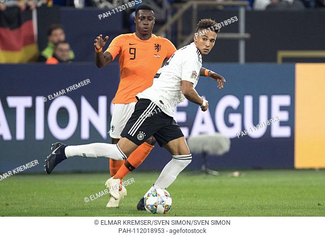 Quincy PROMES (left, NED) versus Thilo KEHRER (GER), action, duels, Football Laender match, Nations League, Germany (GER) - Netherlands (NED) 2: 2