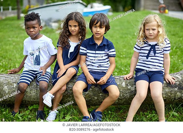 Children with sea clothes, Marina Urola, Santiago beach, Zumaia, Gipuzkoa, Basque Country, Spain, Europe