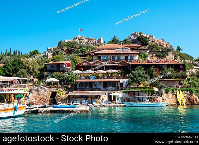 Kekova island, Turkey - July, 2015: Cafe at sea coast, near ruins of the ancient city on the Kekova island, Turkey