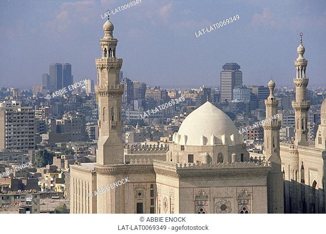 View over Sultan Hassan Mosque to modern city. Skyline. Citiscape