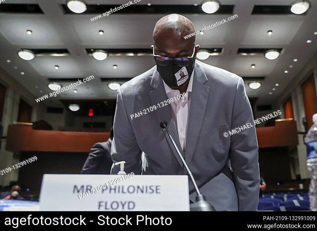 George Floyd's brother Philonise Floyd returns at the end of a lunch recess during the House Judiciary Committee hearing on ""Policing Practices and Law...