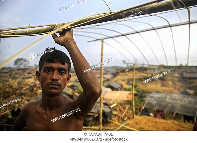 A man Rohingya Muslims refugees cutting hill and built new shelter for living at balu khali camp teknaf