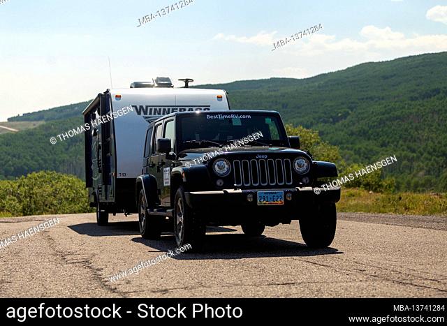 Parking Jeep and Caravan at a Vista Point near Boulder, Utah, USA. Parking Jeep and Caravan at The Hogback - a Vista Point near Boulder, Utah, USA