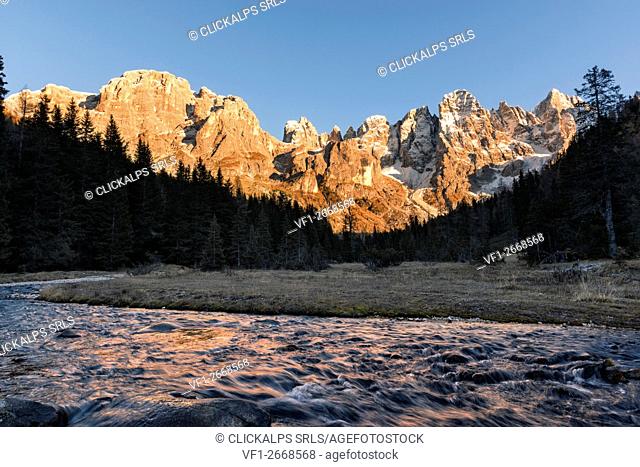 Autumn sunset illuminates the high peaks. Venagia Valley Panaveggio Natural Park Dolomites Trentino Alto Adige Italy Europe