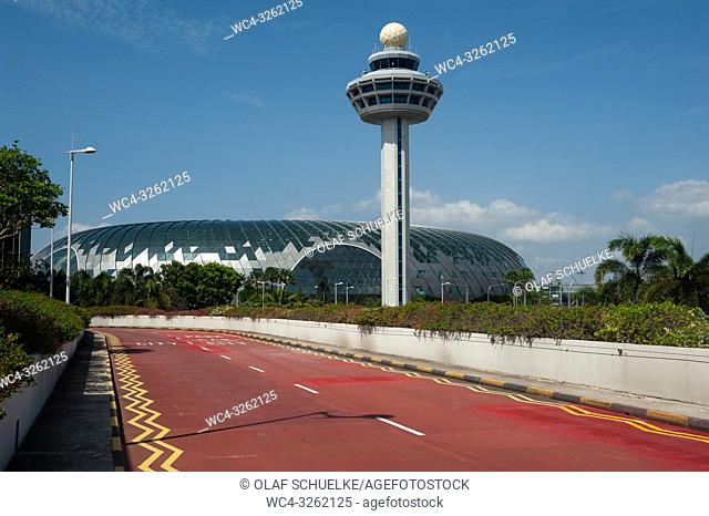 Singapore, Republic of Singapore, Asia - Air traffic control tower and the new Jewel Terminal at Singapore's Changi Airport