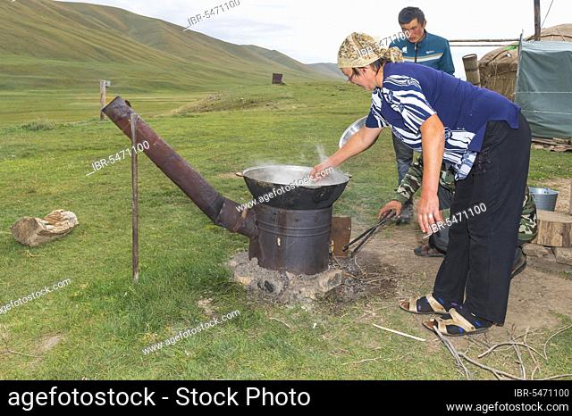 Kazakh nomads preparing noodles, Ile-Alatau National Park, Assy Plateau, Almaty, Kazakhstan, Central Asia, Asia