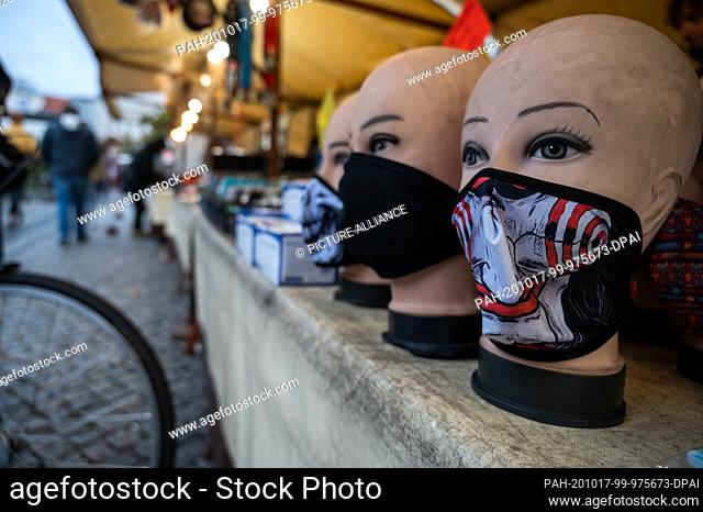 15 October 2020, Berlin: Masks are sold at Hermannplatz. In Neukölln, the number of coronavirus infections has been rising for several days