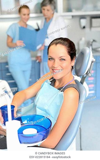 Woman patient sitting chair dental surgery checkup