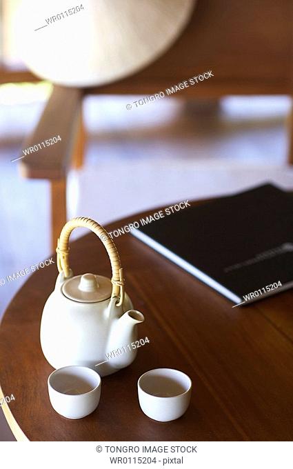 teapot and teacup on the table