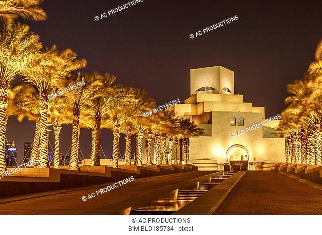 Doha Museum of Islamic Art illuminated at night, Doha, Qatar