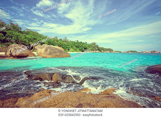 Vintage style beautiful nature of blue sea and white waves near the rocks during summer at Koh Miang island in Mu Ko Similan National Park, Phang Nga province