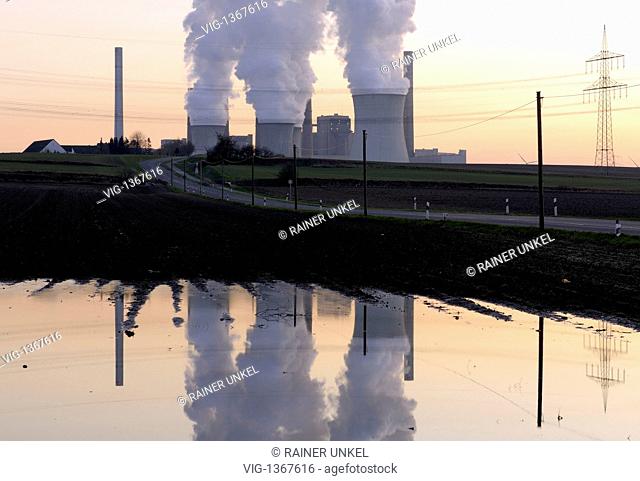DEU, GERMANY : The coal power plant Neurath of RWE AG reflecting in a puddle / Reflections - Neurath, Northrhine-, Germany, 18/03/2009