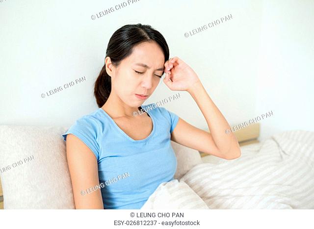 Woman feeling headache