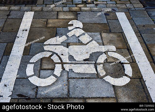 Parking space marking on pavement with motorbike pictogram in Kempten Allgäu, Bavaria, Germany, Europe