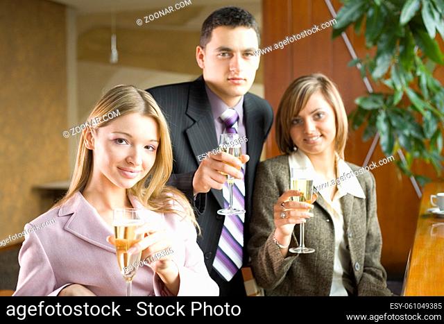 Group of People With Glasses of Champagne. Short Depth of Focus (On Woman's in Pink Jacket Face)