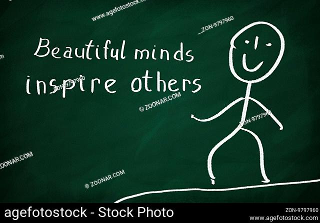 On the blackboard draw character and write Beautiful minds inspire others