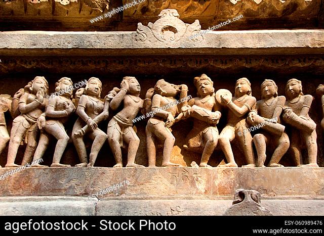 Statue of male, female in myriad moods sculpted on wall panel of Lakshman Temple, Khajuraho, Madhya Pradesh, India, Asia