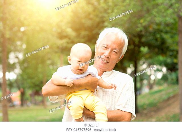 Grandfather and grandson at the park