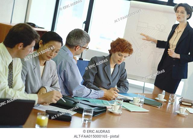 Woman giving business presentation