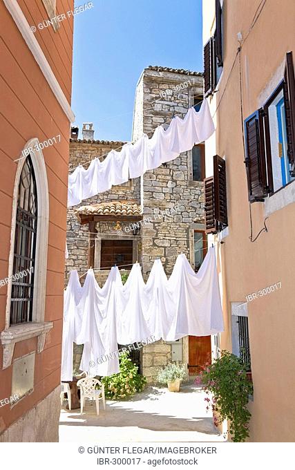 Clotheslines between the houses, Bale Valle, Istria, Croatia