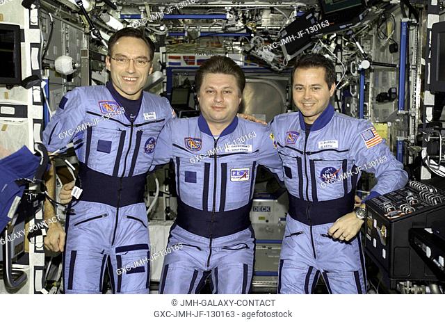 The Expedition Four crewmembers pose for an informal crew photo in the Destiny laboratory on the International Space Station (ISS)